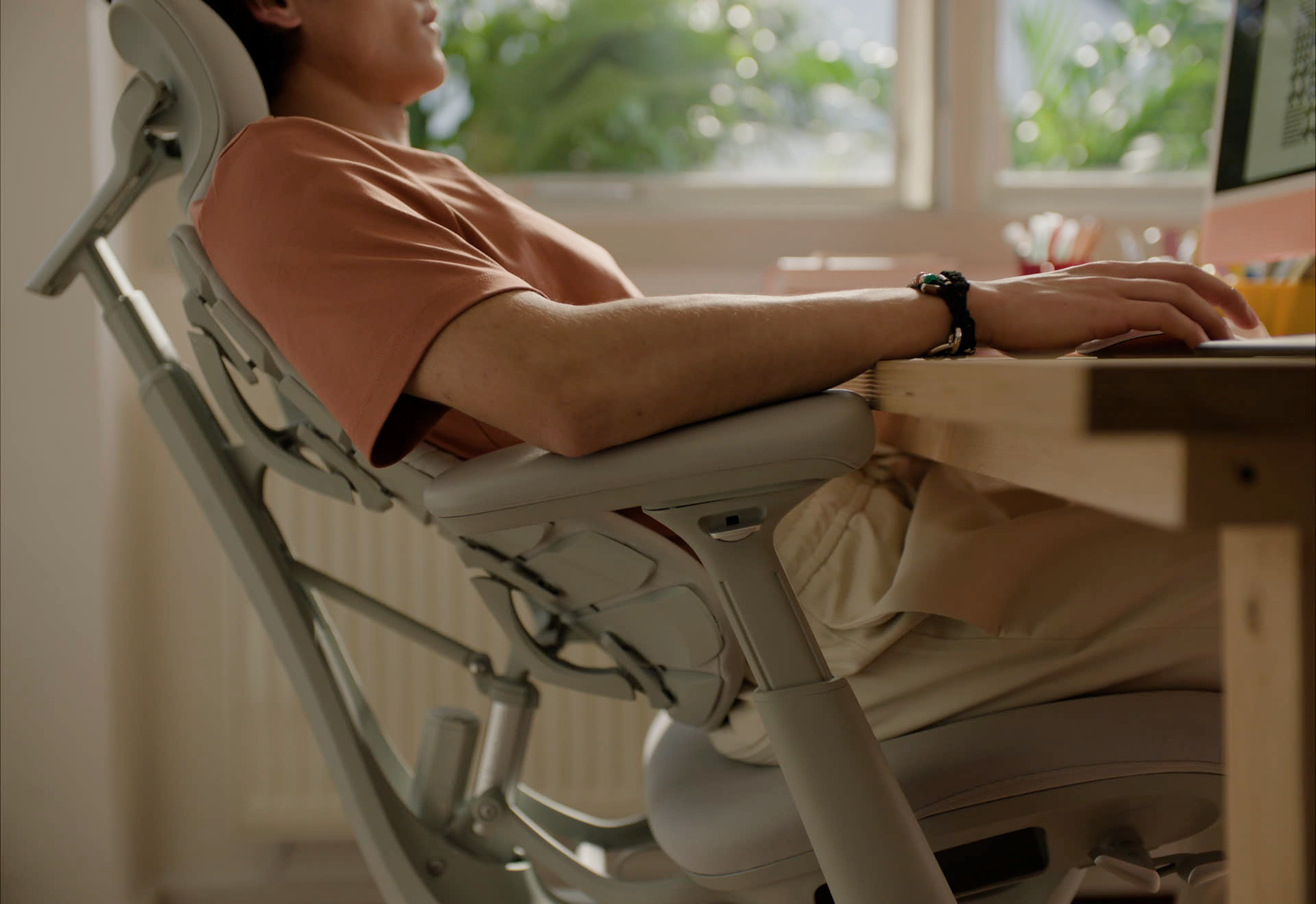 Man leaning back in a reclined office chair