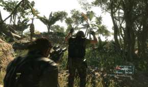 Snake holding a guard hostage at gunpoint in Metal Gear Solid V: The Phantom Pain.