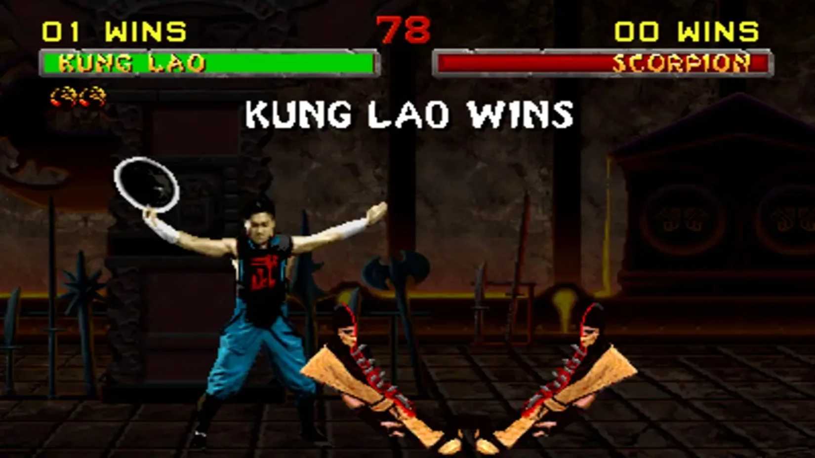 A screenshot of Kung Lao doing a Fatality on Scorpion in Mortal Kombat II