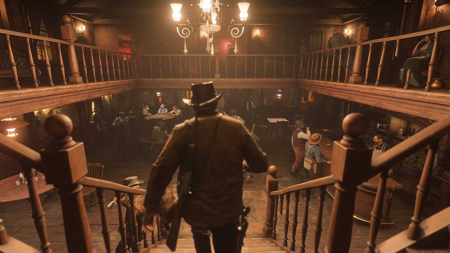 Arthur Morgan walking down the stairs in a tavern in Red Dead Redemption 2.