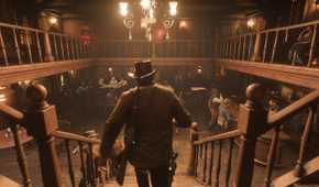 Arthur Morgan walking down the stairs in a tavern in Red Dead Redemption 2.