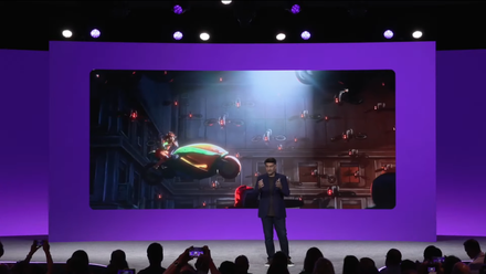Discord brings higher efficiency and battery use to Home windows on Arm with a local app A man on stage in front of a screen showing a 3D animation