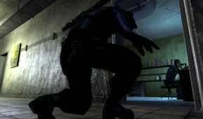 Sam Fisher sneaking up on a guard in Splinter Cell: Chaos Theory.