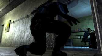 Sam Fisher sneaking up on a guard in Splinter Cell: Chaos Theory.