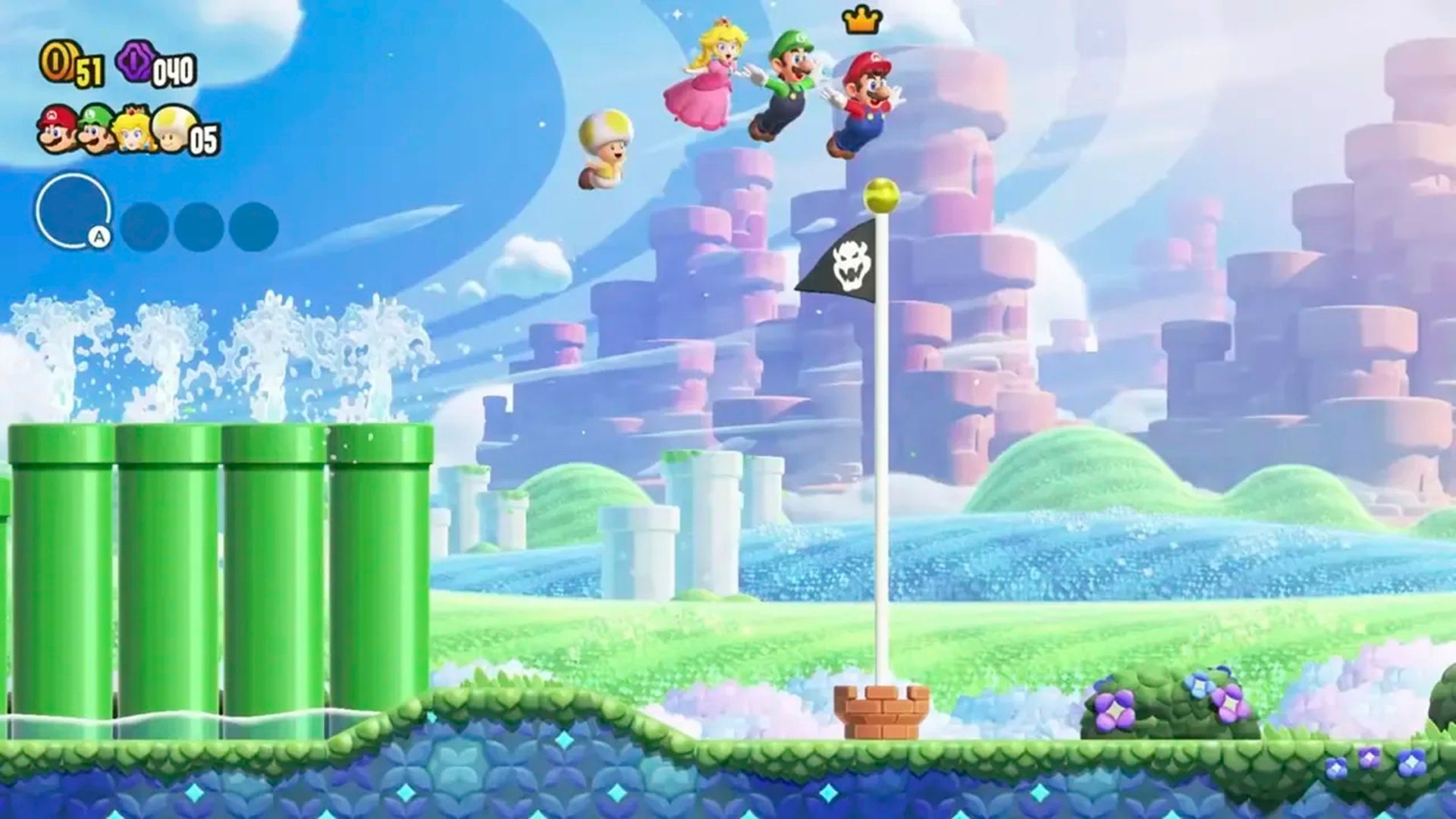 A screenshot of Mario and friends jumping towards the flag poll in Super Mario Bros. Wonder