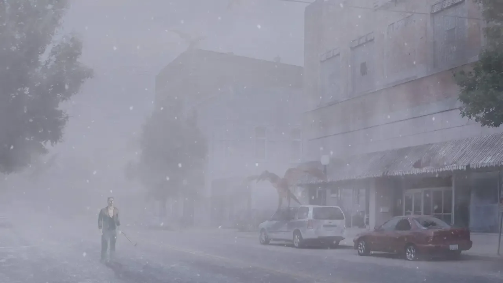 A man walking into a fog filled town