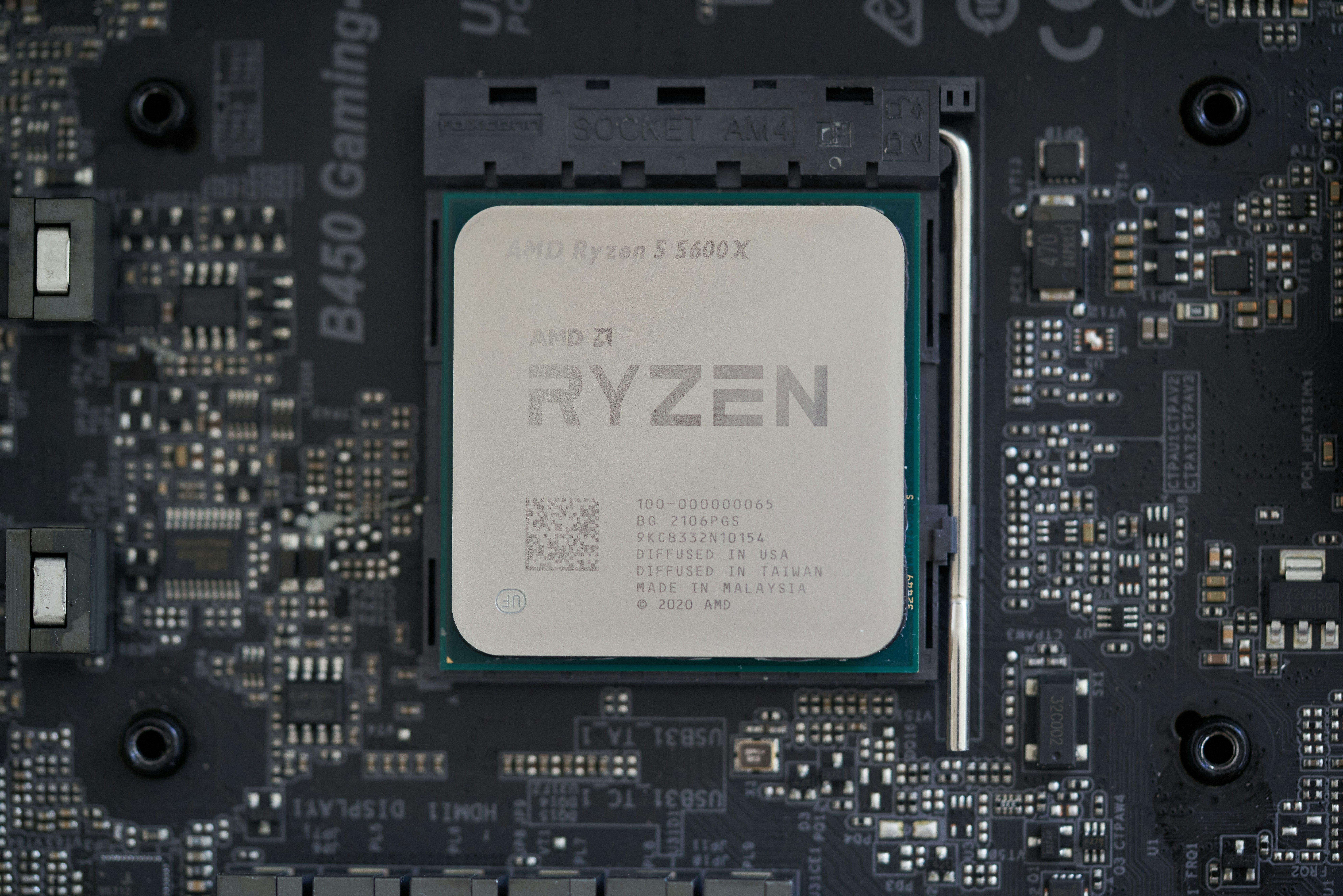 An image of the AMD Ryzen 5600X desktop processor installed on a motherboard.
