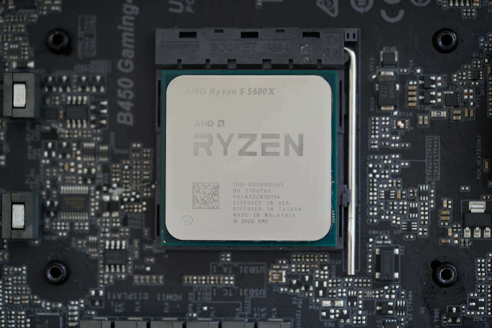 An image of the AMD Ryzen 5600X desktop processor installed on a motherboard.