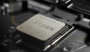 An image of an AMD Ryzen CPU installed on a motherboard.