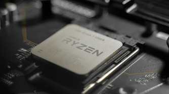 An image of an AMD Ryzen CPU installed on a motherboard.