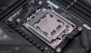 An image of an AMD Ryzen CPU installed on an ASUS motherboard.