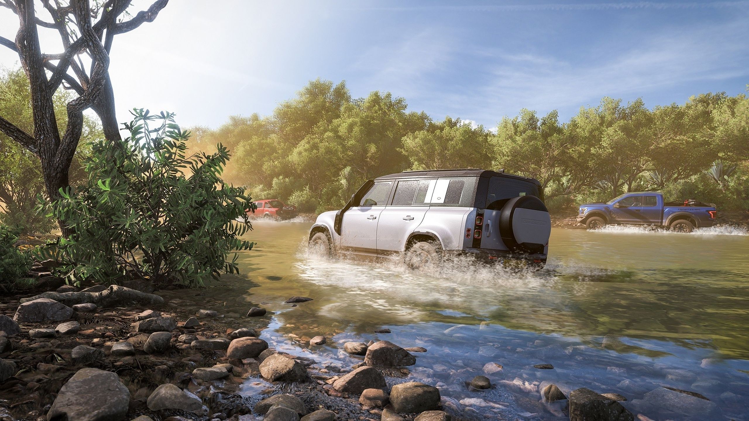 A Land Rover Defender wading through water in Forza Horizon 5.