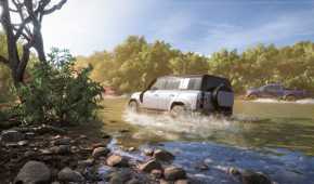 A Land Rover Defender wading through water in Forza Horizon 5.
