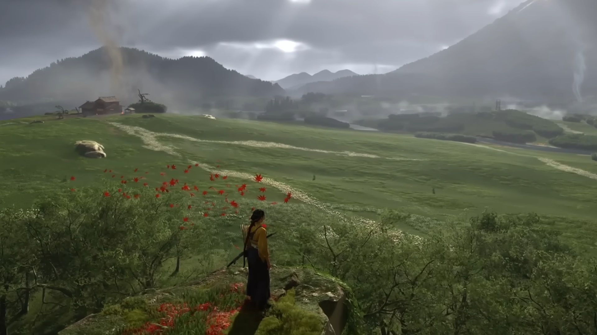 A screenshot of Atsu looking out into the distance near a hot spring in Ghost of Yotei