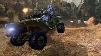 Blue team players in Halo riding a Warthog.