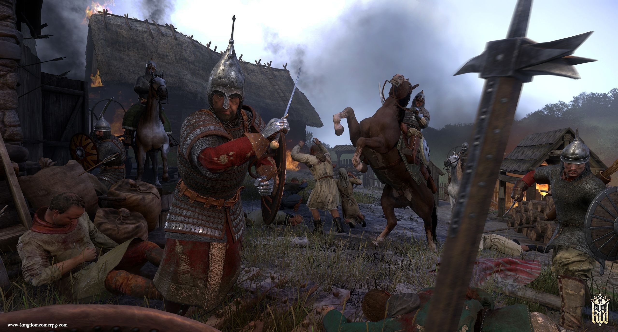 Combat inside a burning village in Kingdom Come: Deliverance.