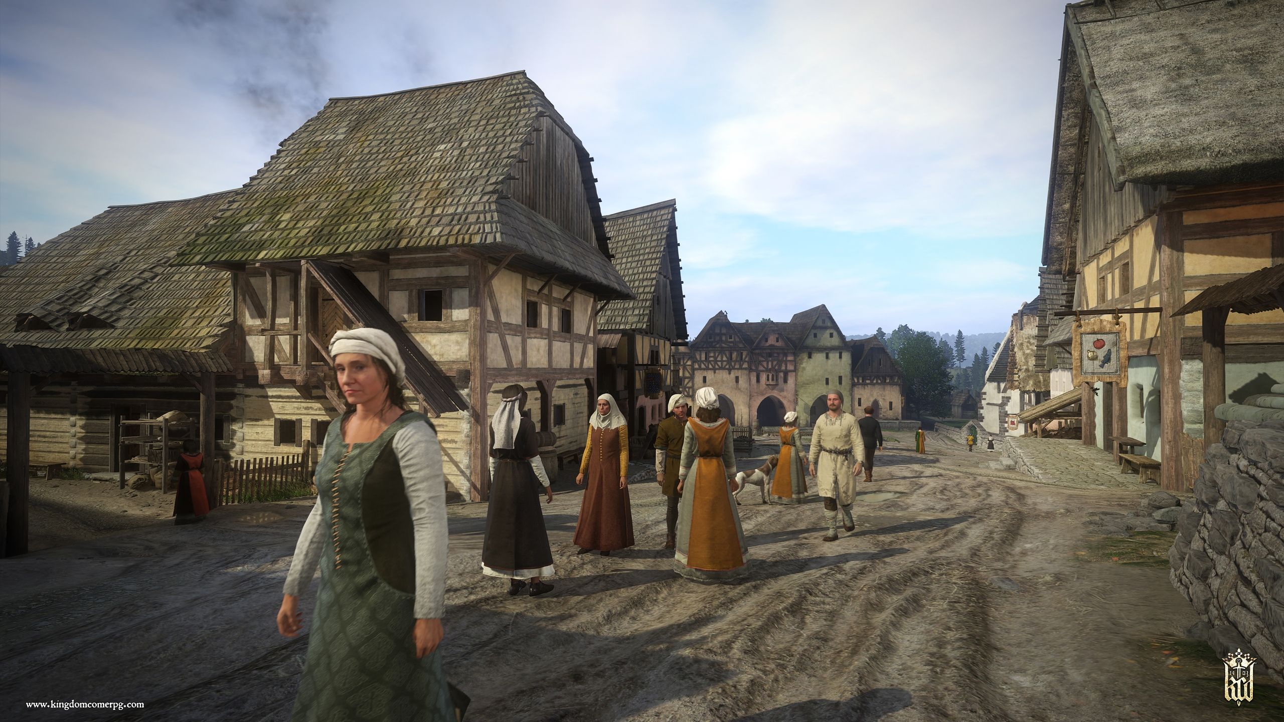 A dirt road in a village in Kingdom Come: Deliverance.