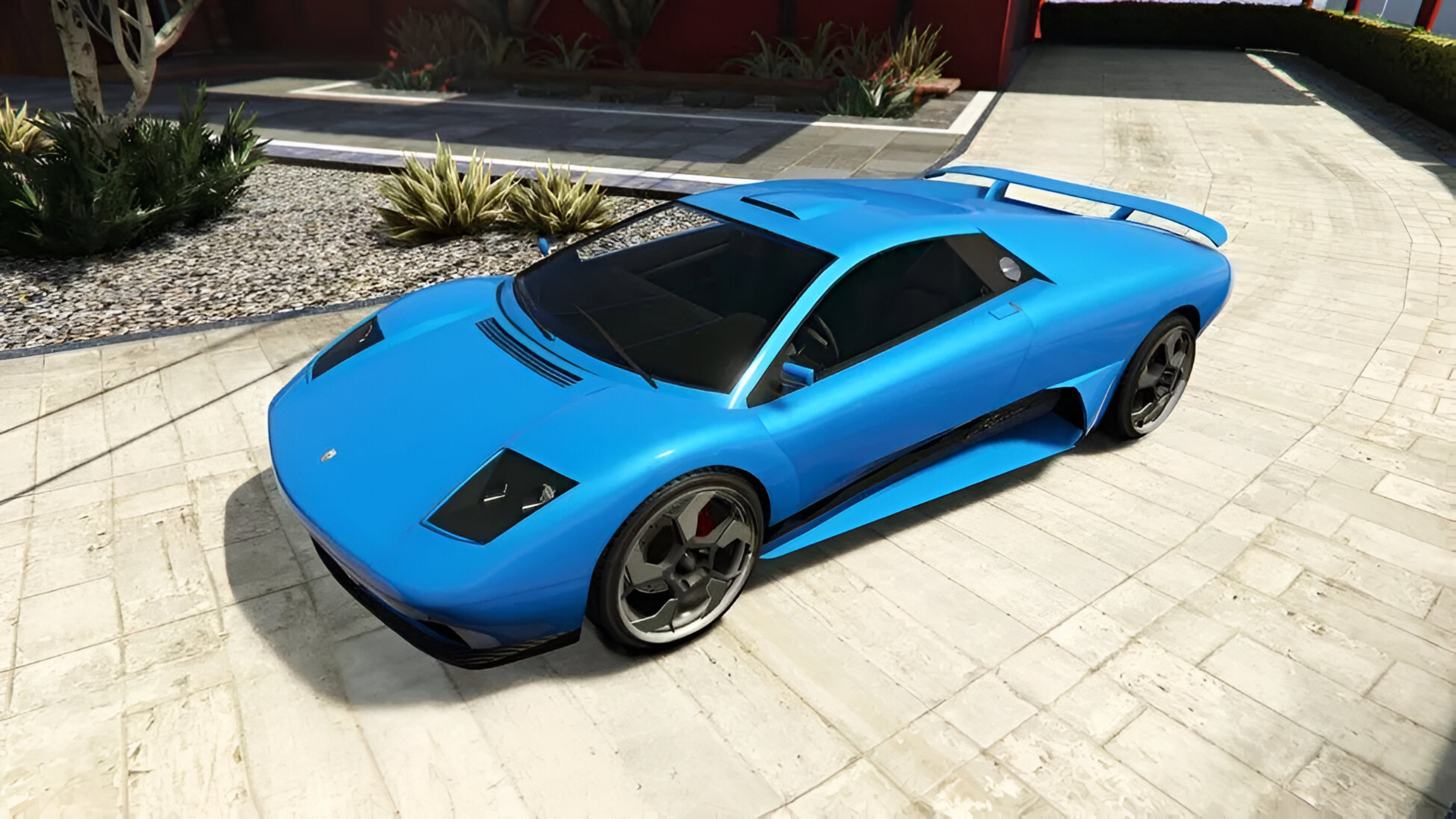 A blue Pegassi Infernus in GTA V.