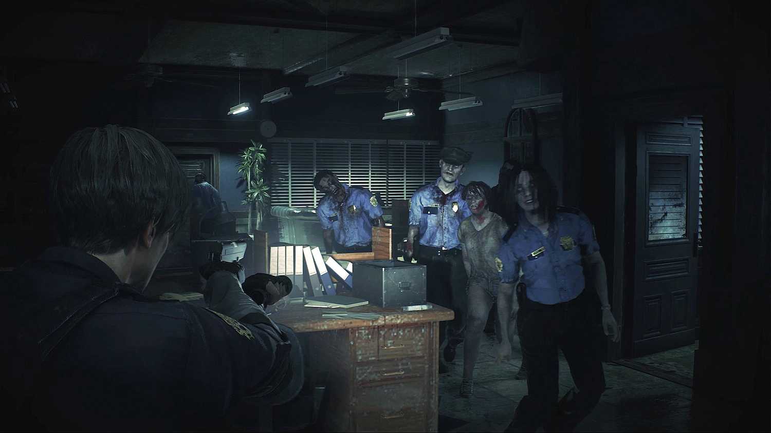 Lumbering zombie cops in Resident Evil 2 remake.