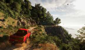 An F-150 Raptor driving down a mountain trail in Hawaii in Test Drive Unlimited Solar Crown.