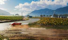 A muscle car drifting next to sunflower fields in Hawaii in The Crew: Motorfest.