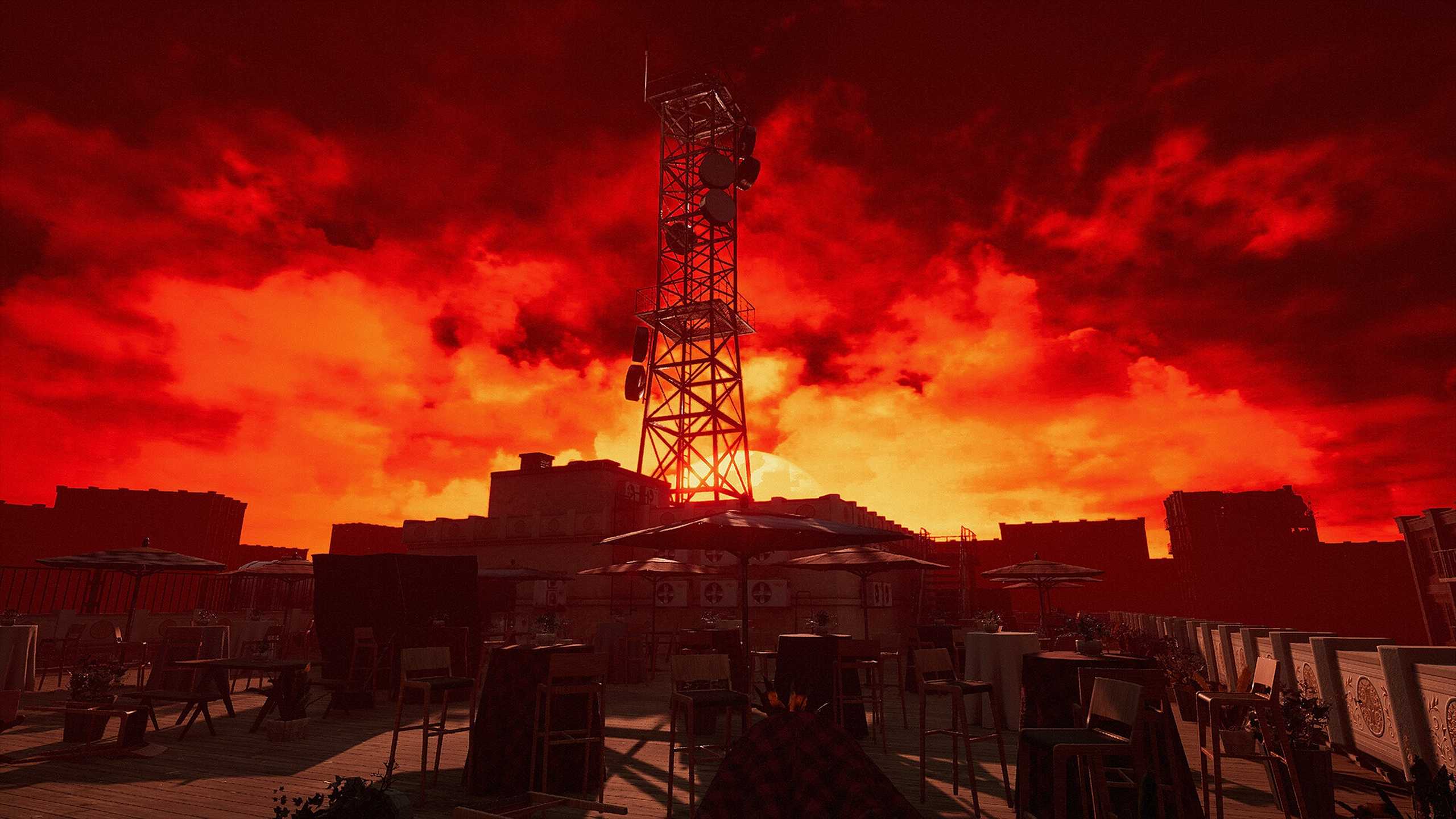 A radio tower with the sky a fiery red in The Inn-Sanity.