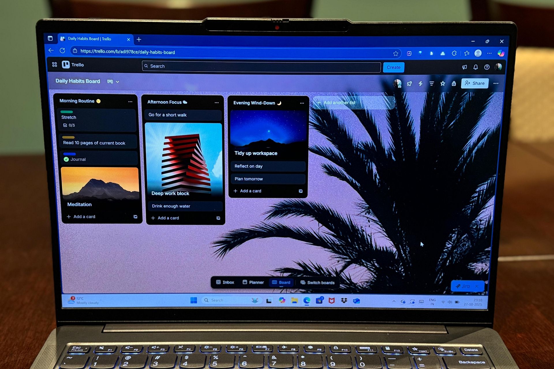 Trello board open on laptop screen