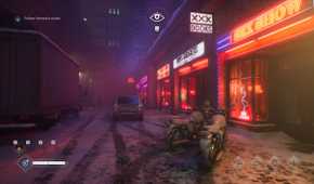 A snow-laden street lined with shops in Vampire: The Masquerade – Bloodlines 2.