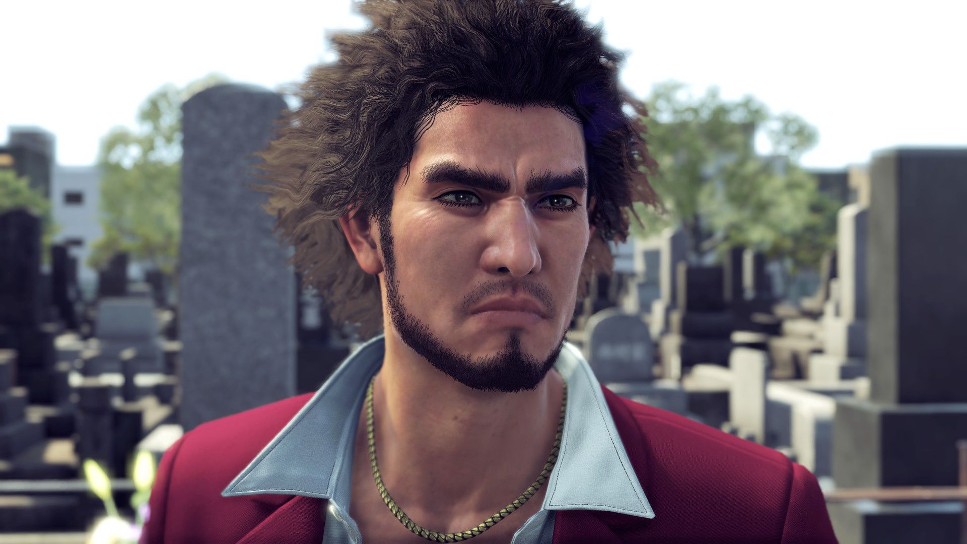 Ichiban Kasuga at a graveyard in Yakuza: Like a Dragon