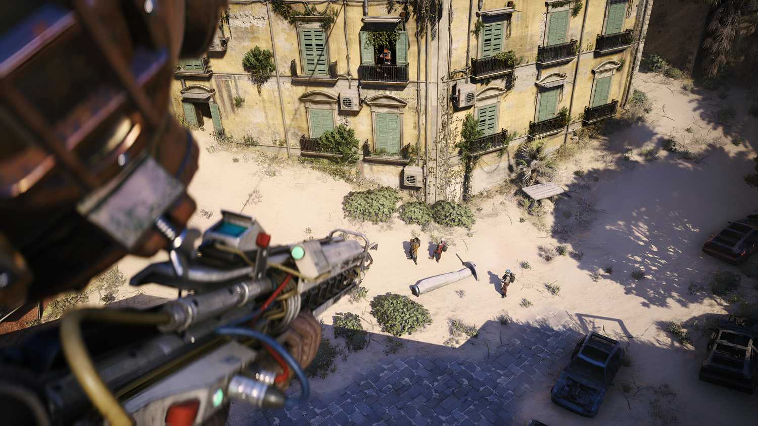 A player aiming a weapon at three raiders on the ground in Arc Raiders.