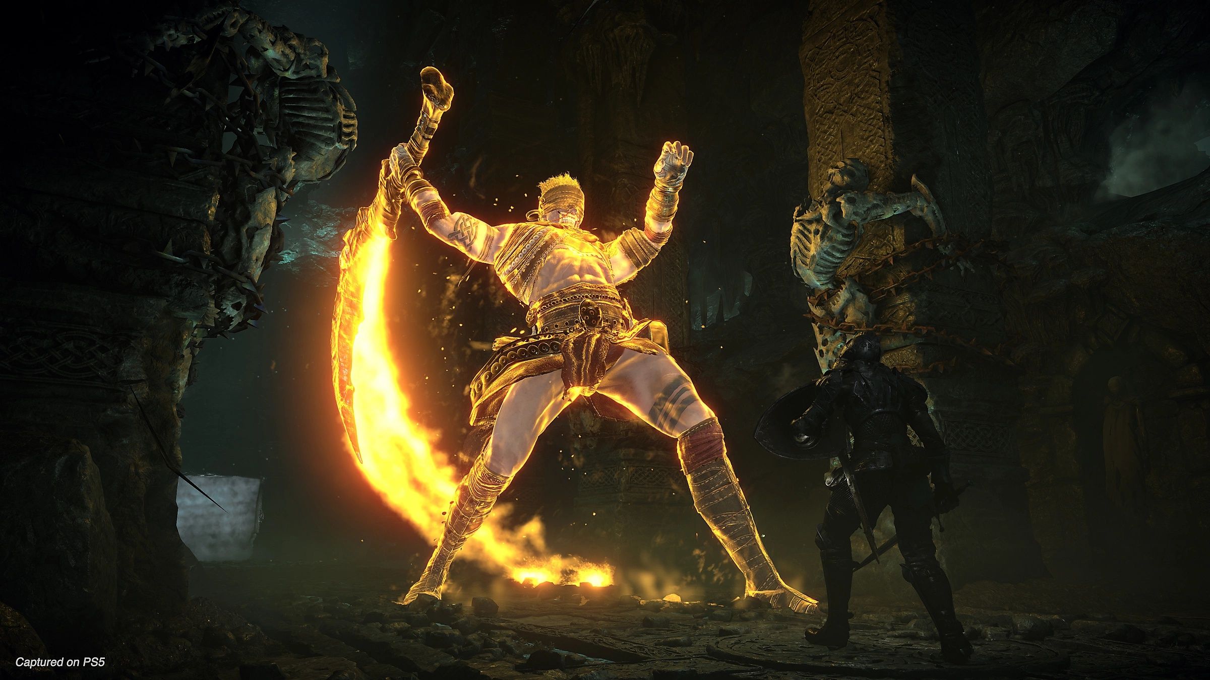 Fighting the Old Hero in Demon's Souls (2020).