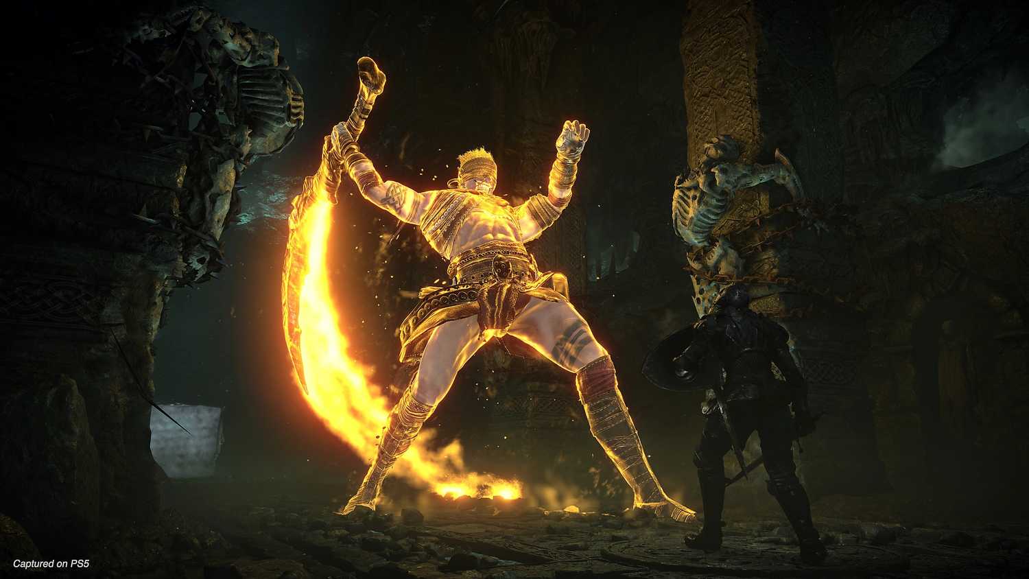 Fighting the Old Hero in Demon's Souls (2020).