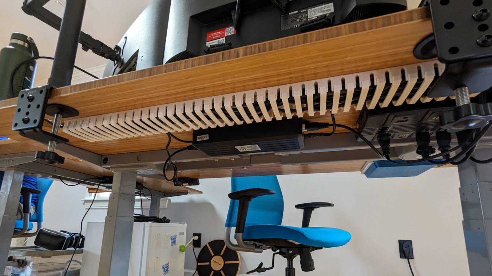 If you 3D print a cable management tray for under your desk, it will improve your entire setup