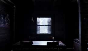 Standing in a dark cabin in Prologue: Go Wayback
