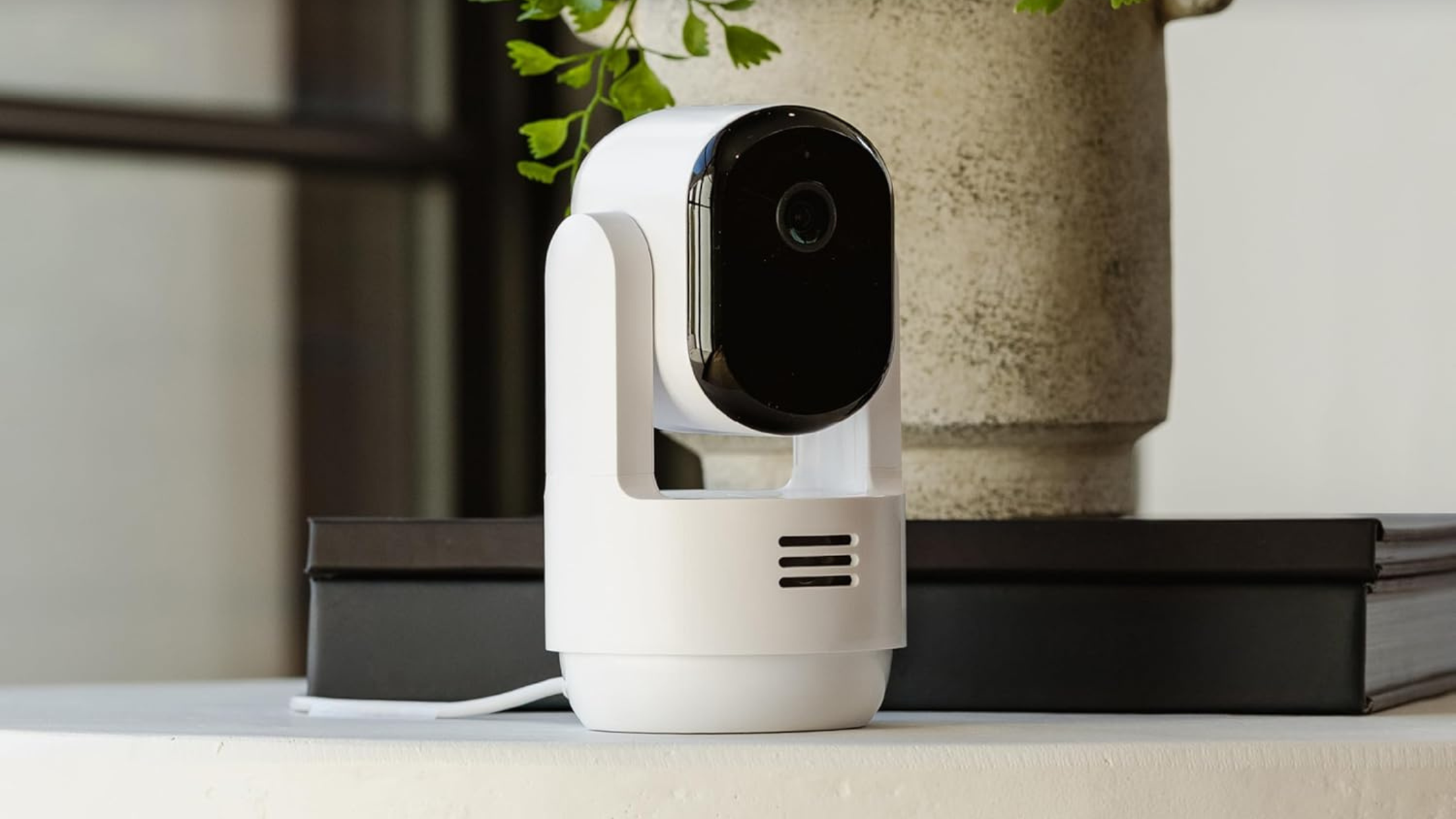  Arlo Essential Indoor Pan Tilt Security Camera  in room