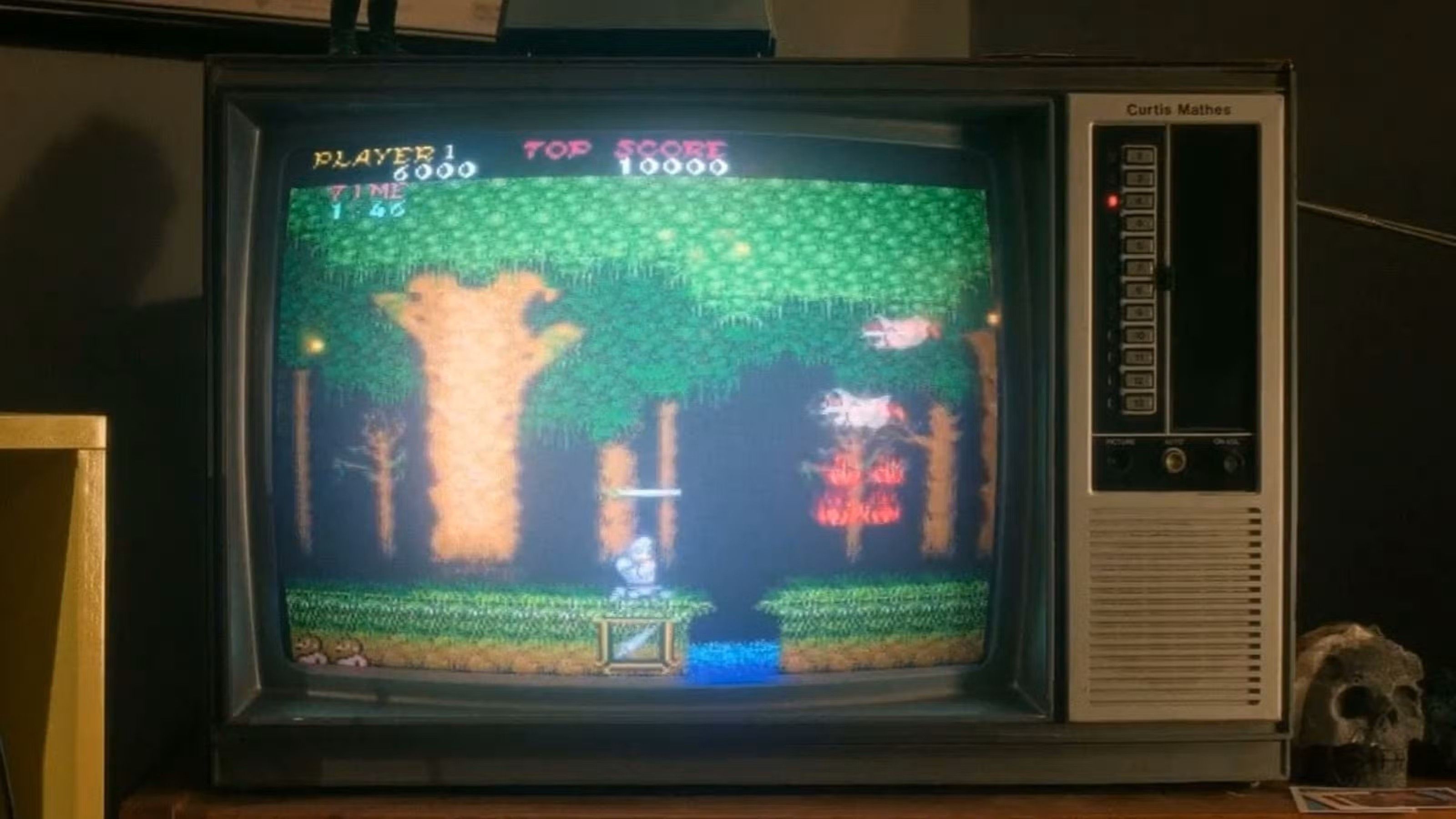 The arcade version of Ghost 'n Goblins wrongly playing on a NES connected to a TV in Stranger Things 5