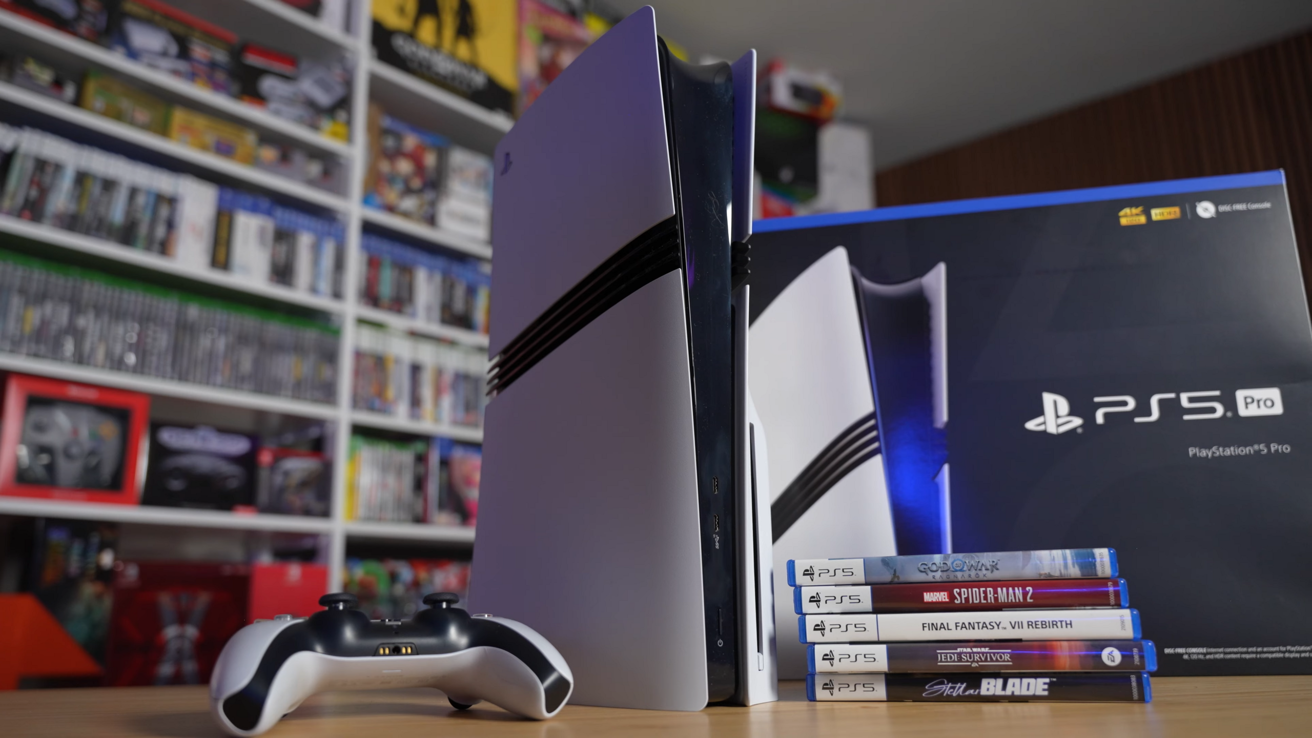 Consola PlayStation 5 Pro con discos de juegos.
