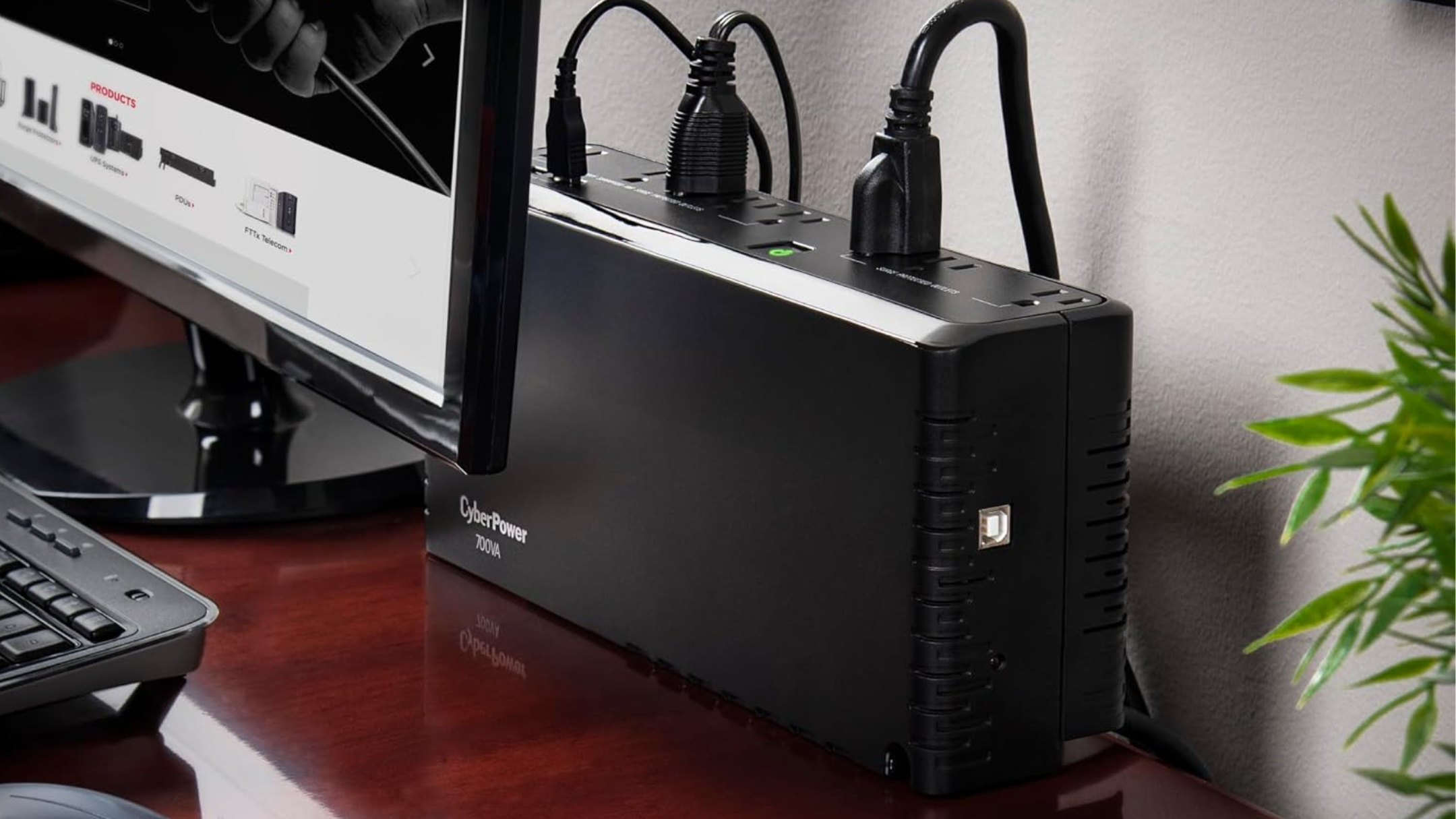 CyberPower SL700U Standby UPS Battery Backup and Surge Protector on desk