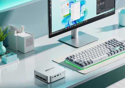 acemagic k1 on desk next to keyboard