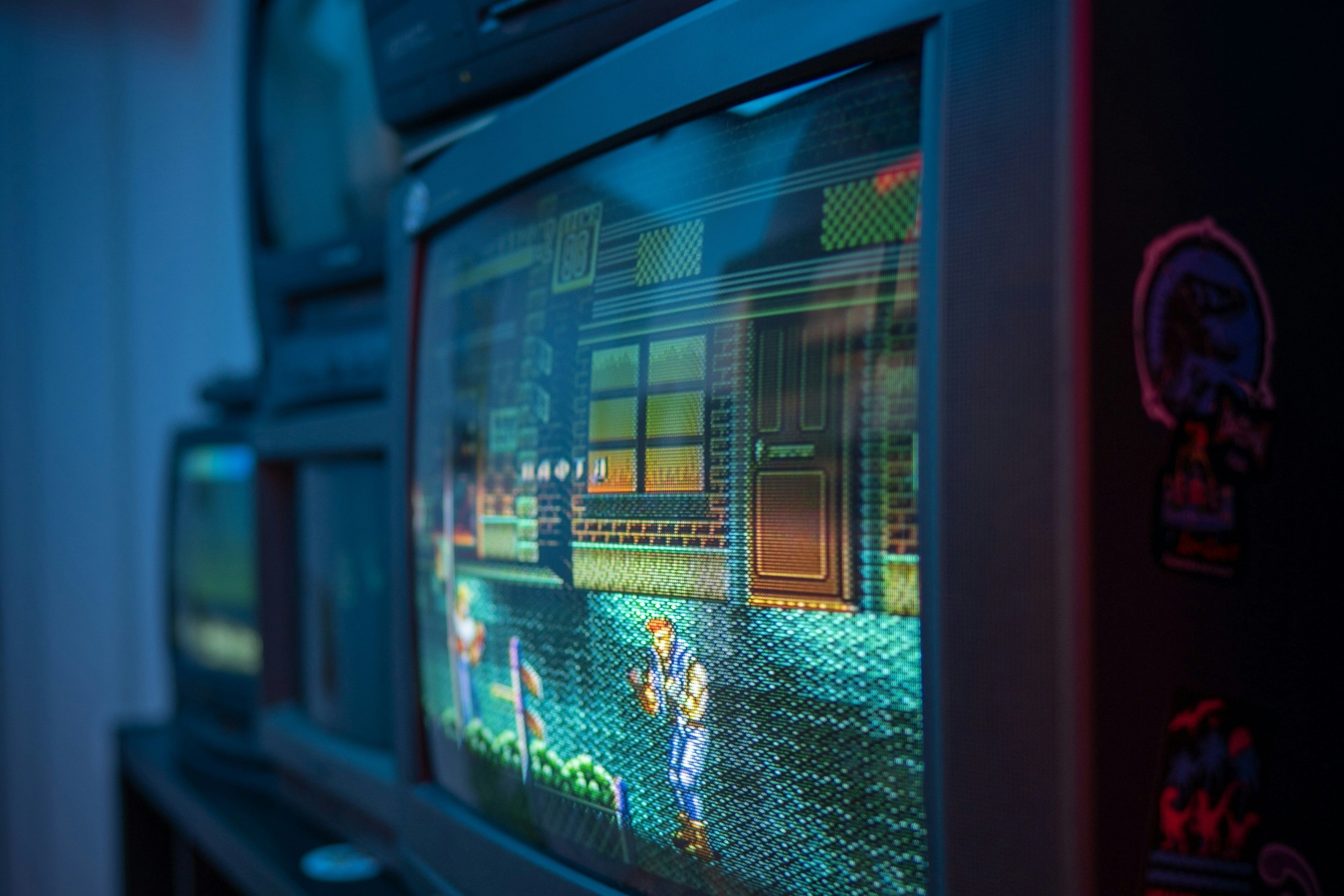 A CRT TV running a fighting game