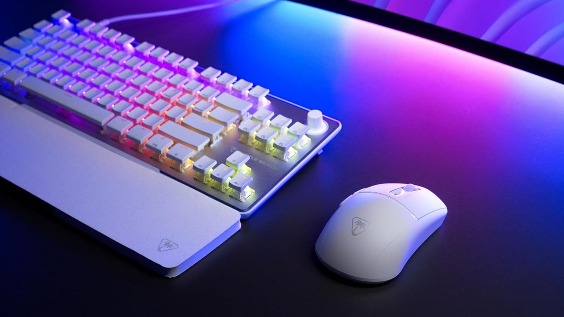Turtle Beach Burst II Air Wireless Gaming Mouse on desk next to keyboard