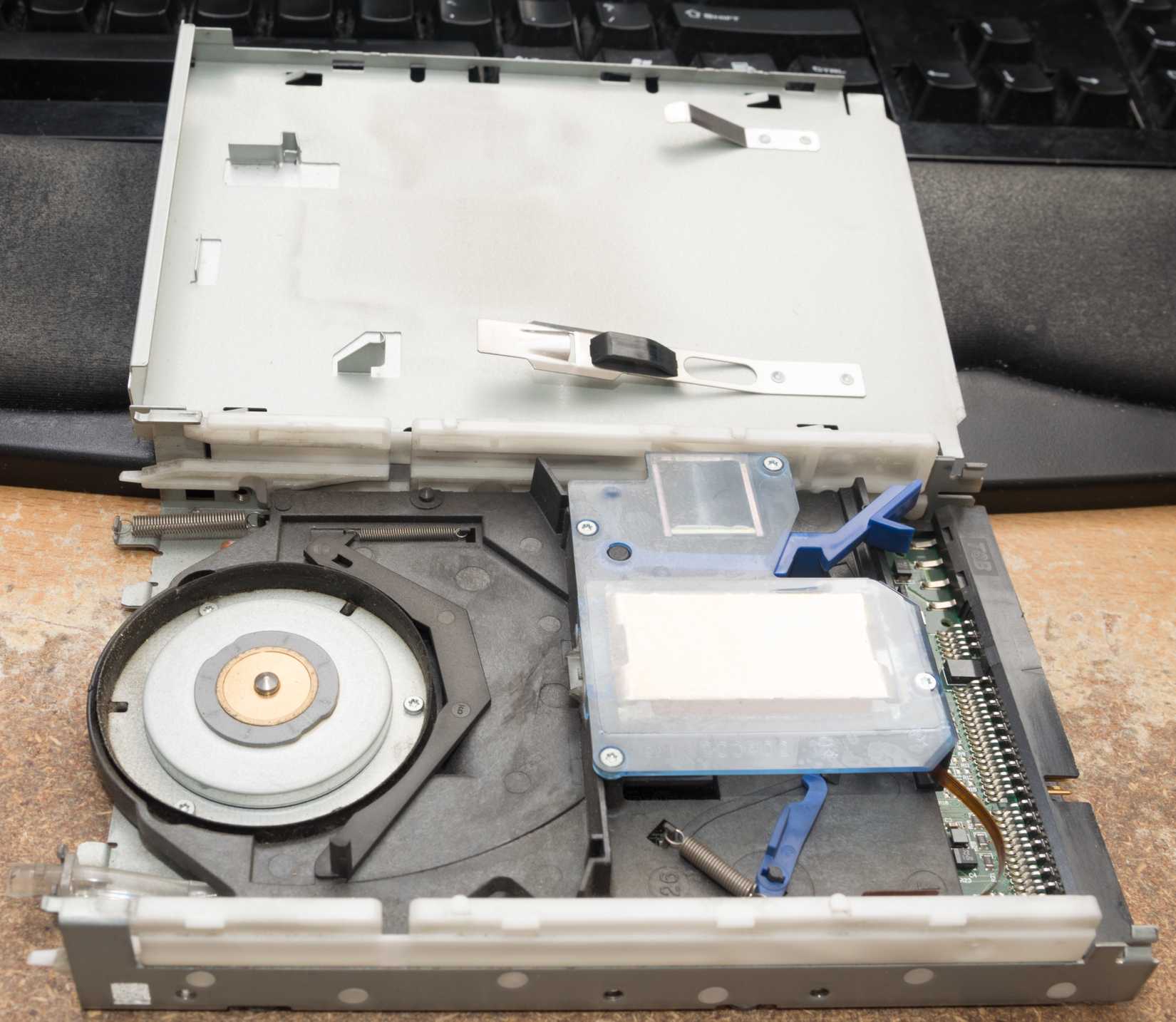 A Zip drive opened up to expose its internal components