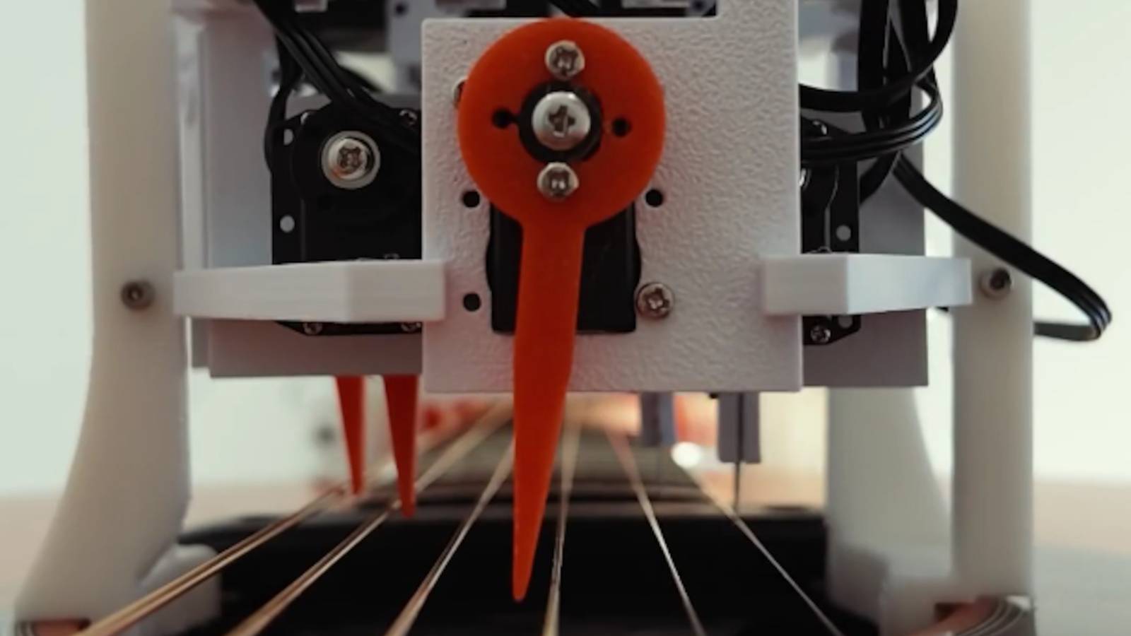 This musical string-plucking robot can play a physical guitar for you, and more instruments are on the way