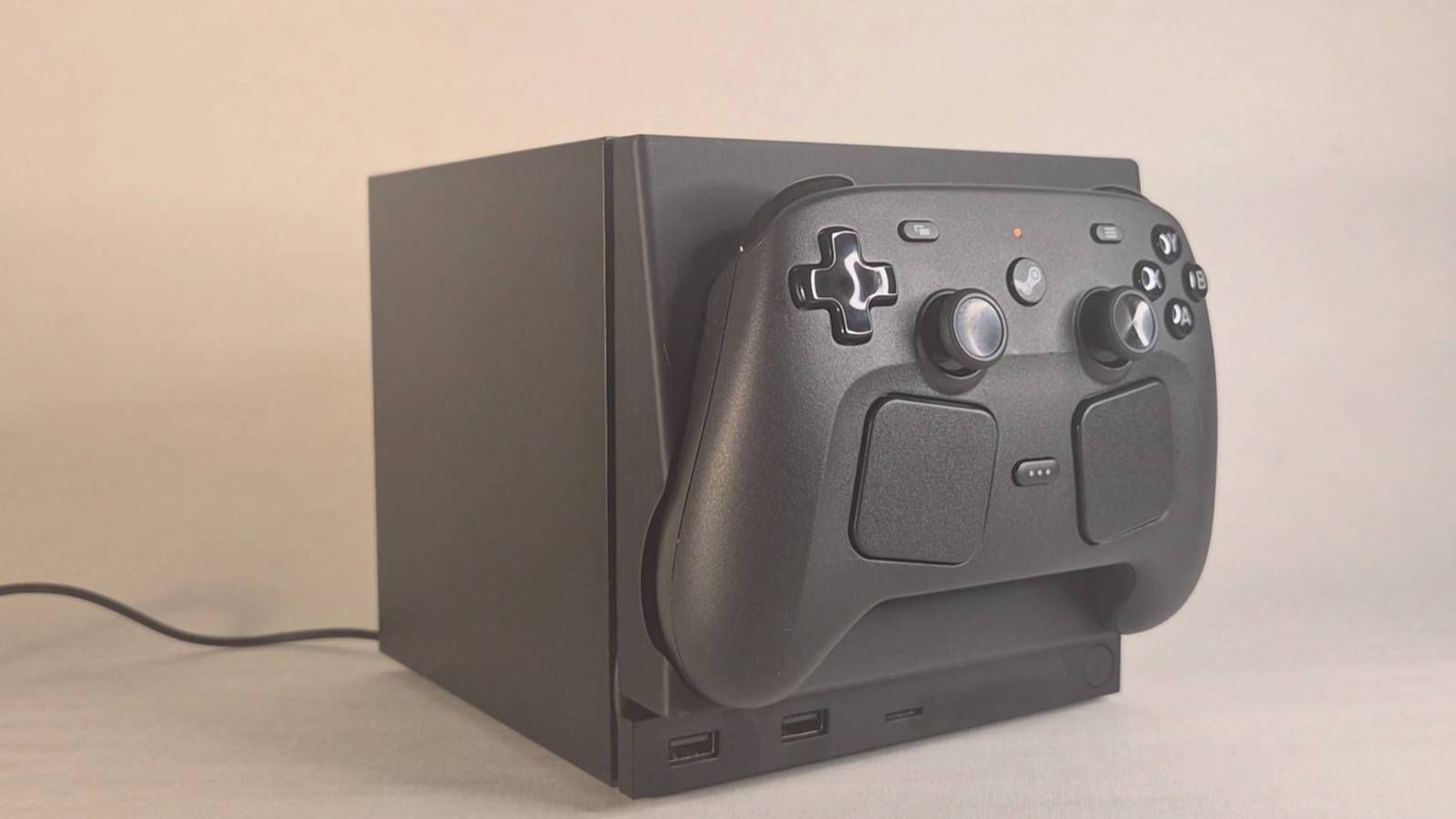 Someone built a Steam Machine face plate that lets you stick your Steam Controller onto it