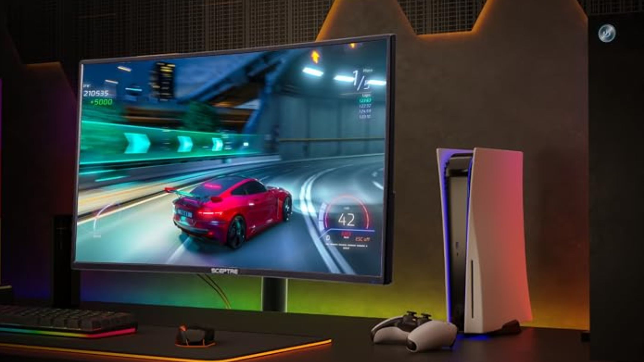 Sceptre 27-Inch Curved Gaming Monitor next to gaming console on desk