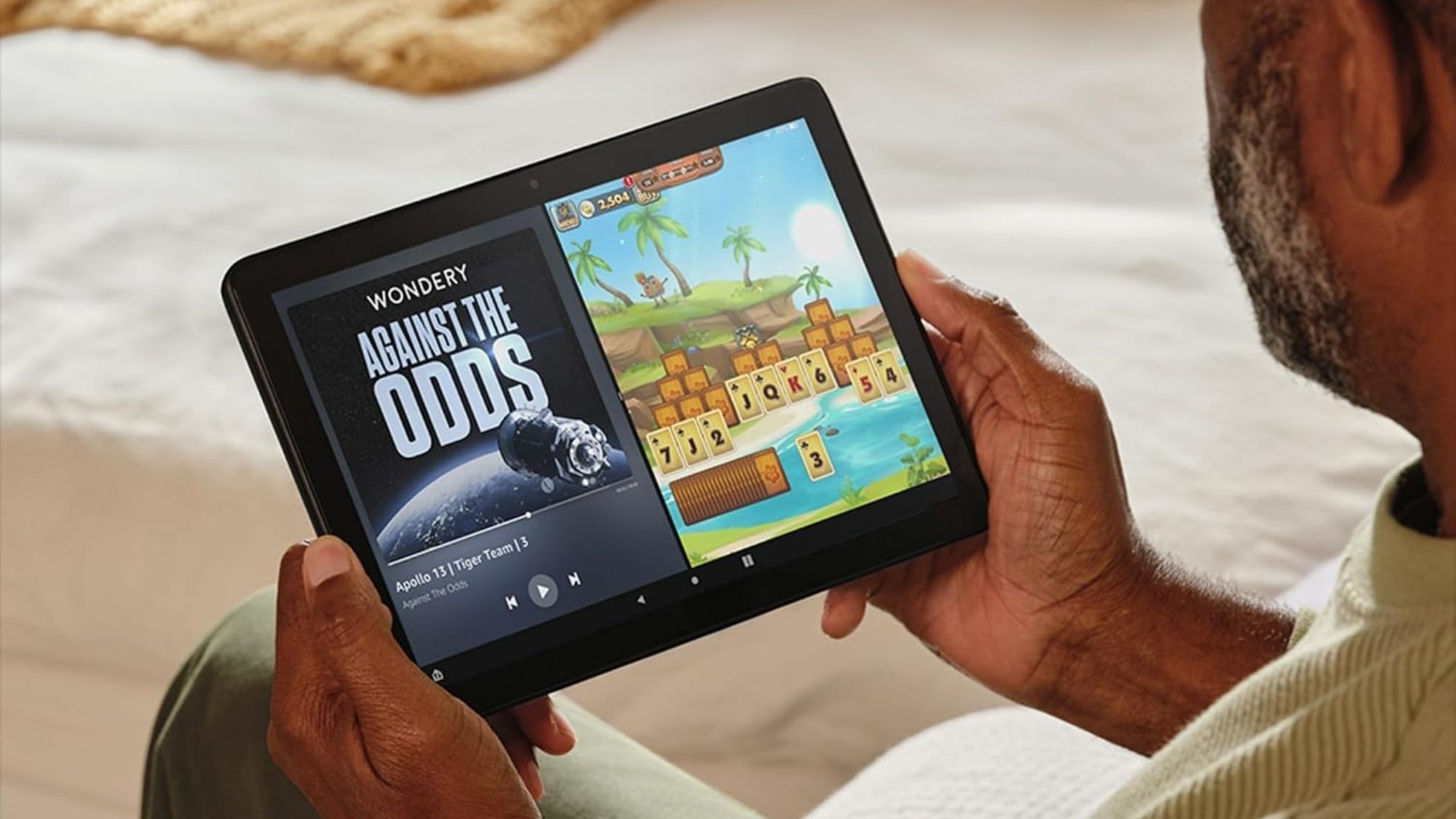 Amazon Fire HD 10 tablet in person's hands