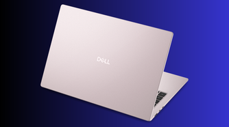 Rear view of a soft pink Dell laptop lid open Dell logo centred on the cover