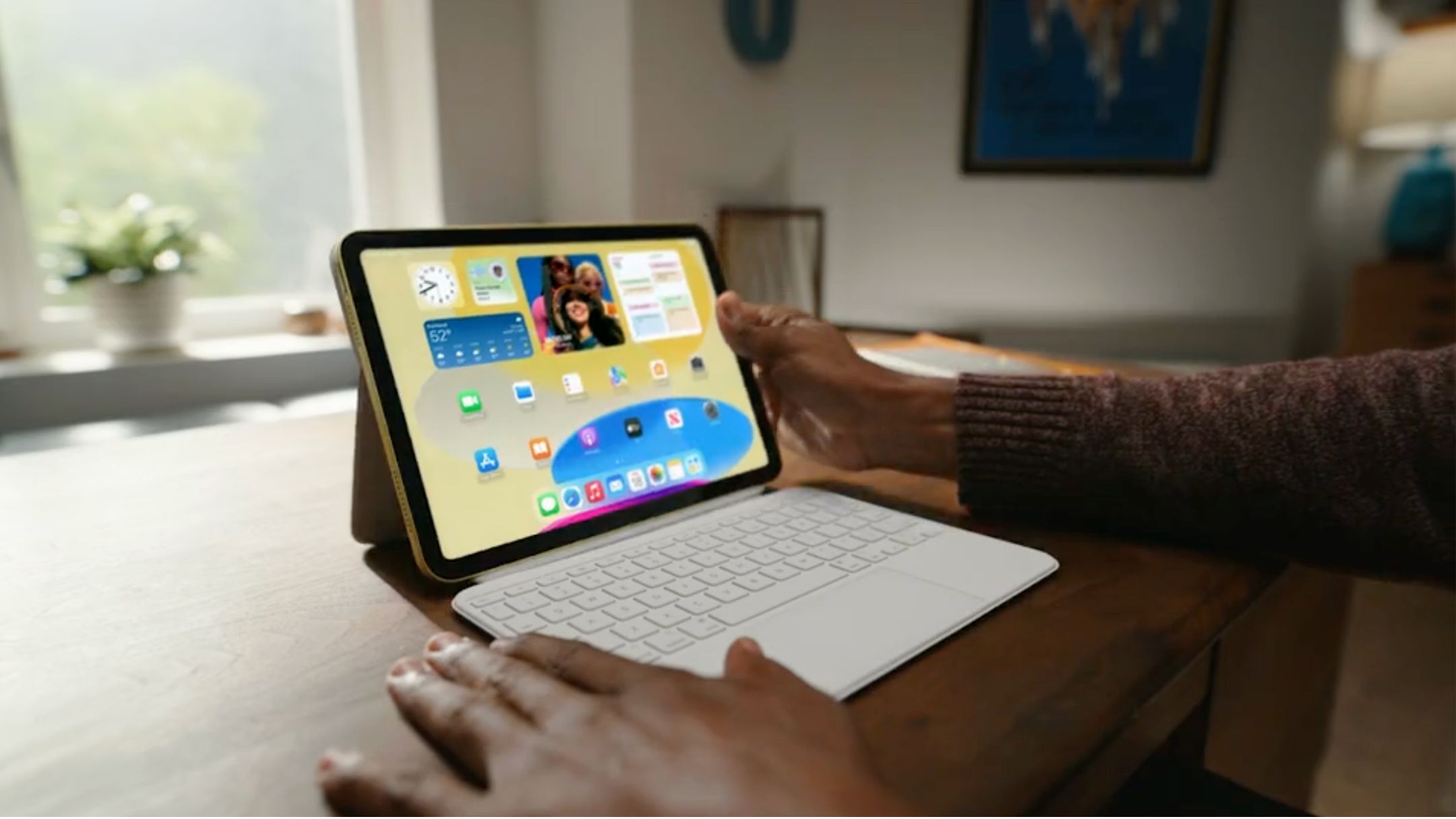 Person using Apple Magic Keyboard Folio