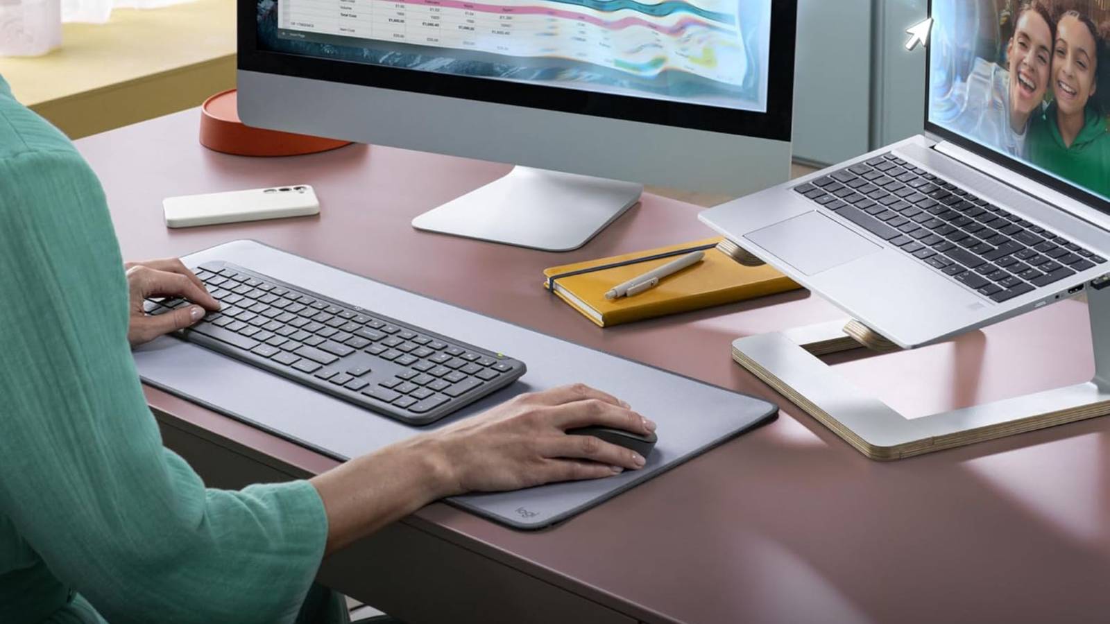person using Logitech MK955 Signature Slim Wireless Keyboard Mouse Combo