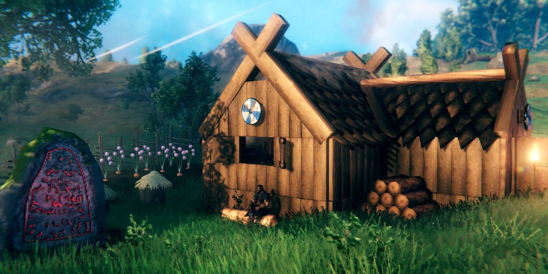 A wooden cabin in a field